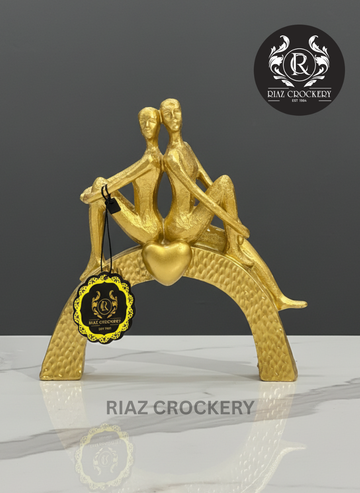 GOLDEN TWIN STATUE