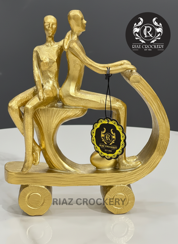 GOLDEN SCOOTY STATUE