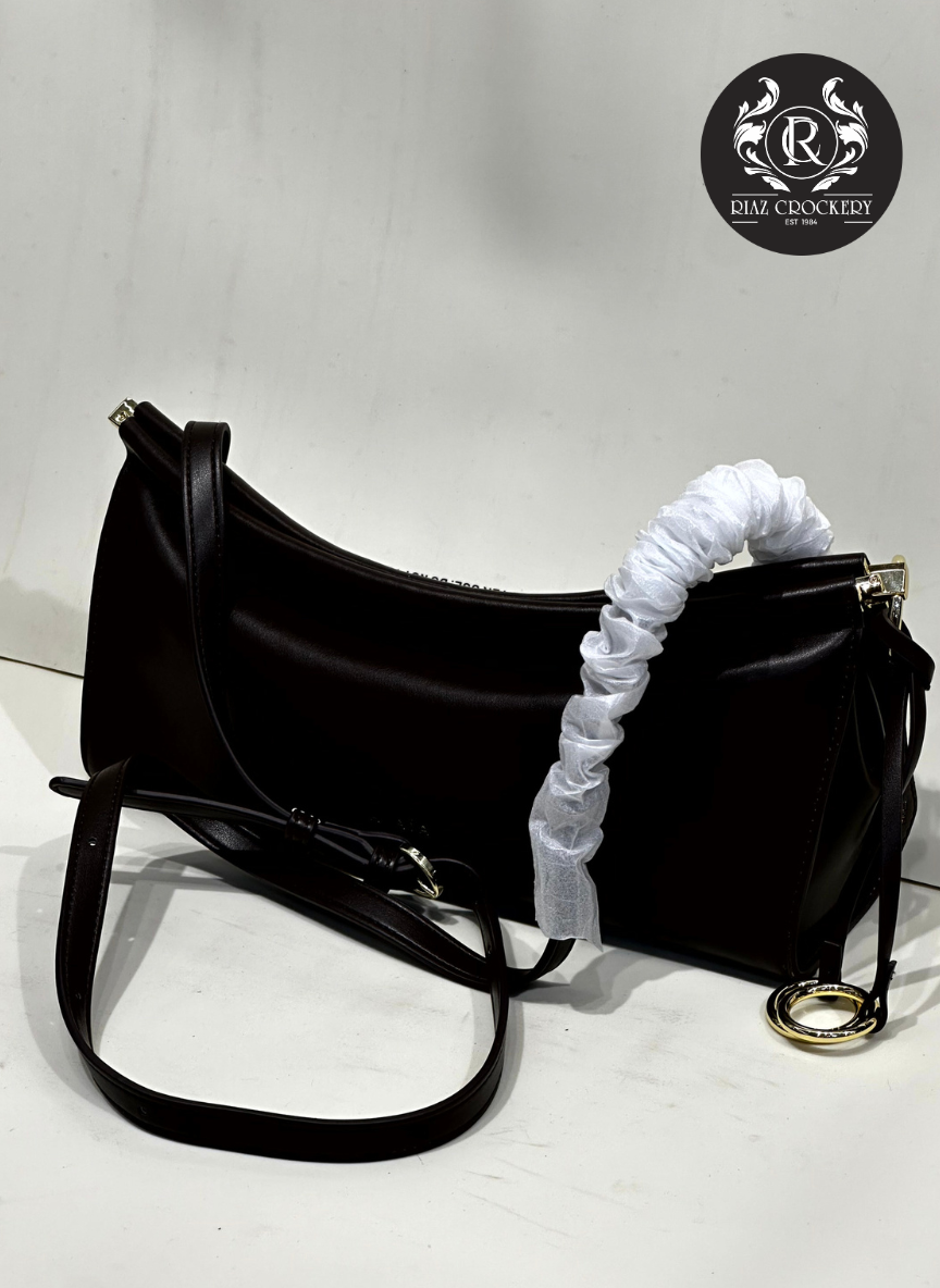 ALAIA PARIS CARRY PURSE
